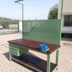 work-bench with plywood platform toll panel drawers and vise